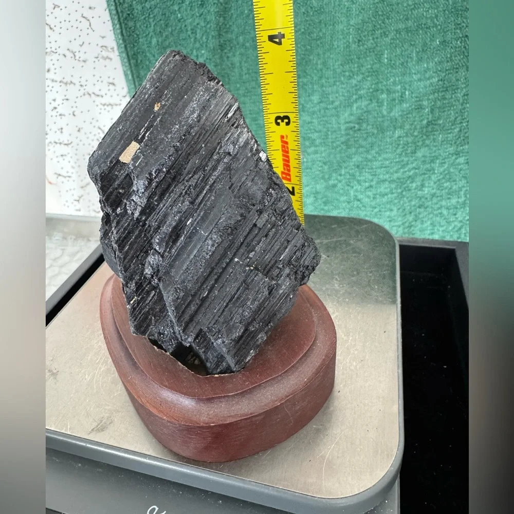 Black tourmaline on wooden stand base